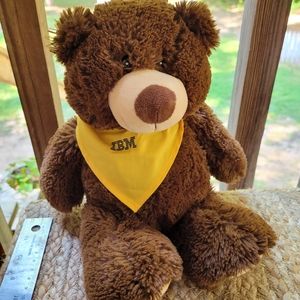 IBM teddy bear with yellow neck scarf